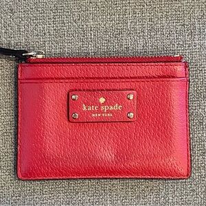 Kate Spade small red card/coin holder. Used condition.